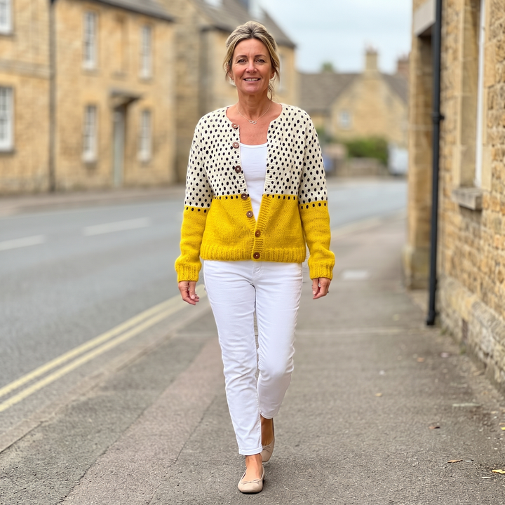 Junella two-tone knit cardigan by Bennett and Lowe, featuring a cozy, stylish design with contrasting color blocks and button details.
