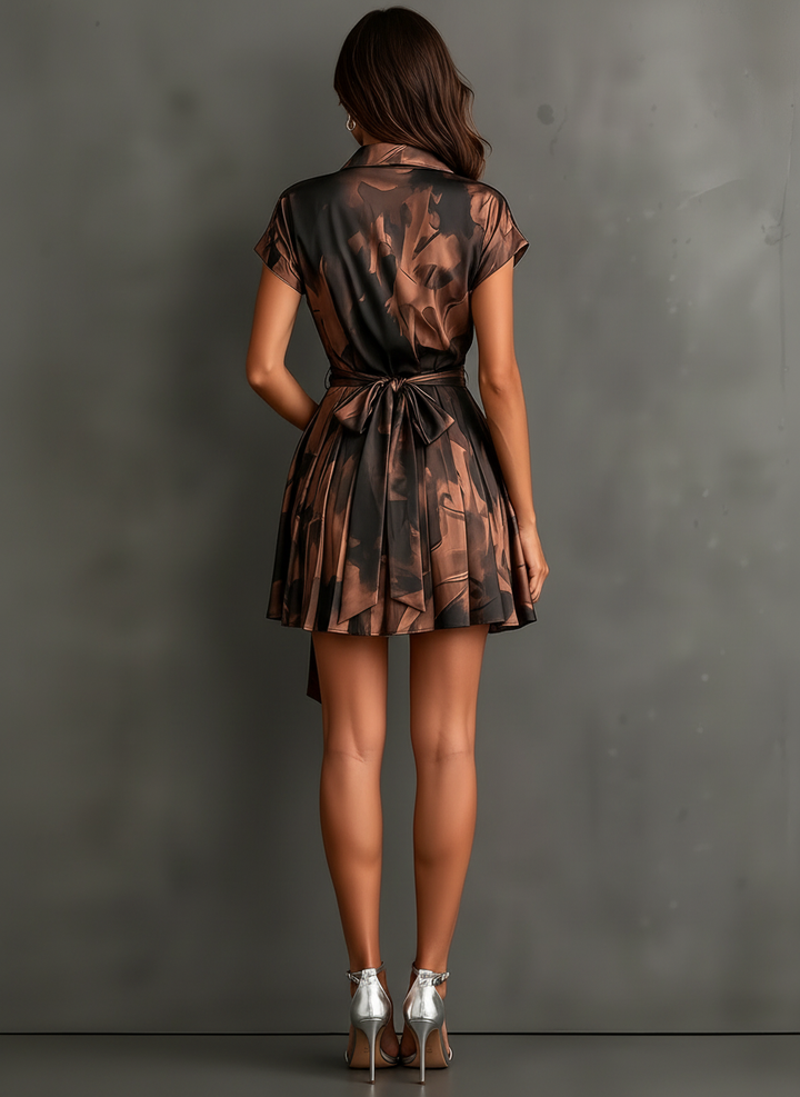 Brown abstract print mini wrap dress by Bennett & Lowe featuring a stylish, fitted silhouette and long sleeves.