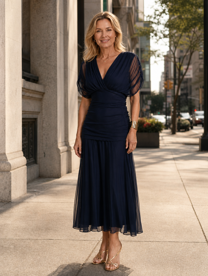 Seraphine Bennett and Lowe Ruched Flutter Midi Dress, signature vestidos with elegant ruching and flowing flutter details.