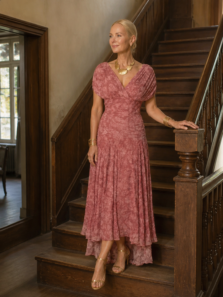 Elegant flowing Amelia dress from Bennett and Lowe's Vestidos Signature collection, featuring smooth fabric and graceful design.