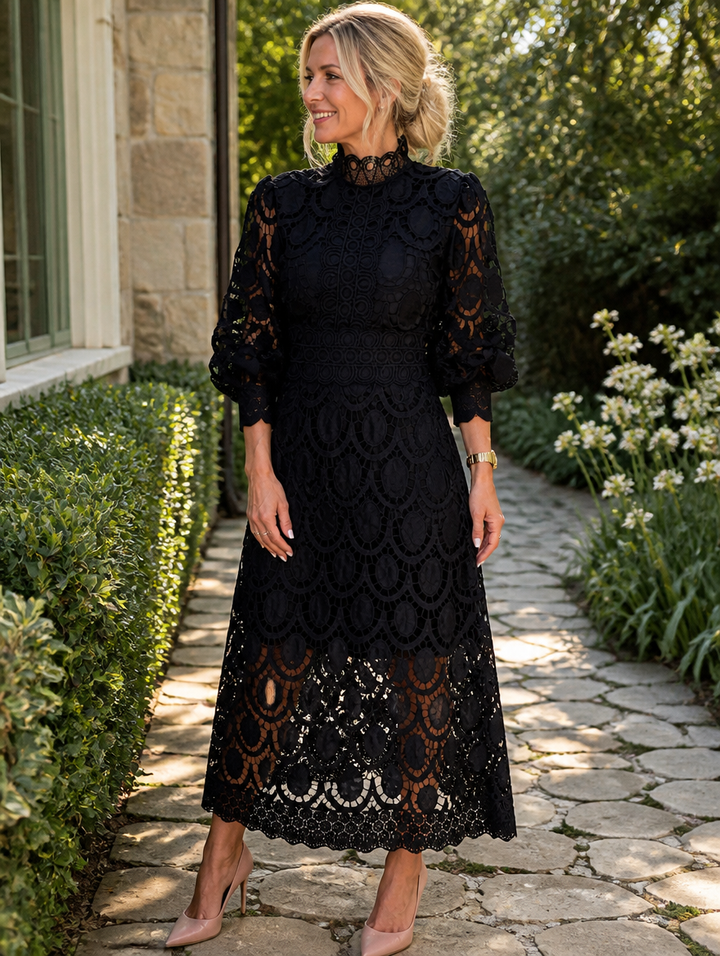 Elegant Bennett and Lowe Urbana midi dress in soft fabric, featuring a fitted waist and flowing skirt, perfect for formal occasions.