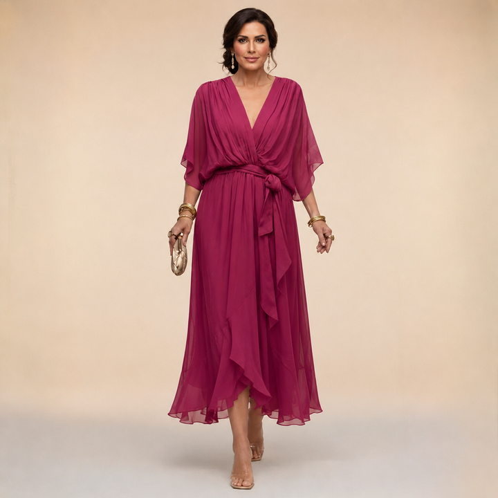 Monica Bennett and Lowe V-Neck Dress in soft fabric, featuring a flattering V-neck and elegant design, shown on a model.