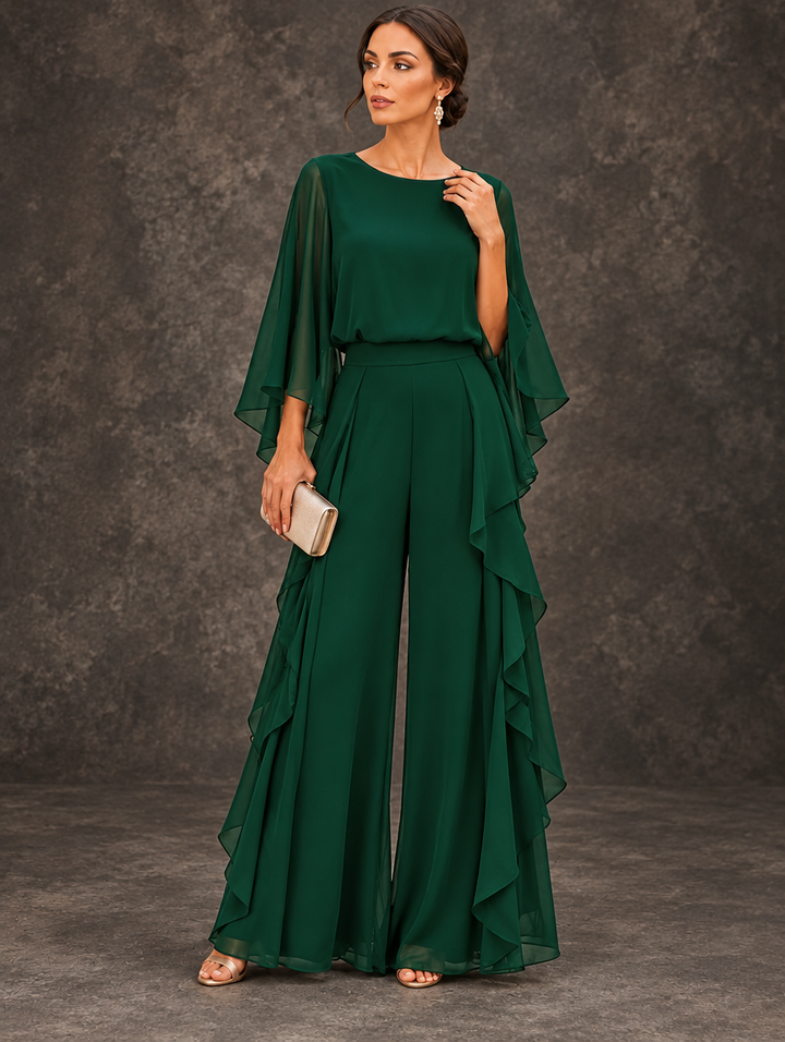 Gloria two-piece set by Bennett & Lowe featuring a cape-sleeve top and ruffle skirt, shown in a stylish, coordinated outfit.