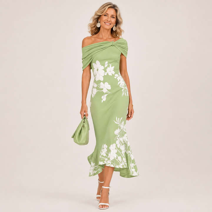 Floral contour midi dress by Bennett and Lowe featuring a fitted waist and flowing skirt, perfect for elegant summer occasions.