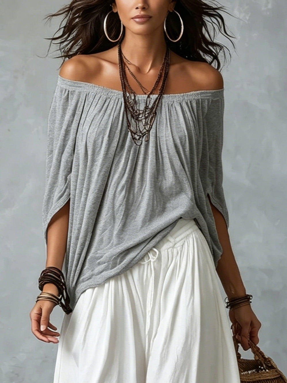 Leslie off-shoulder two-piece bohemian set by Bennett and Lowe, featuring a flowing, stylish top and matching skirt on a model.