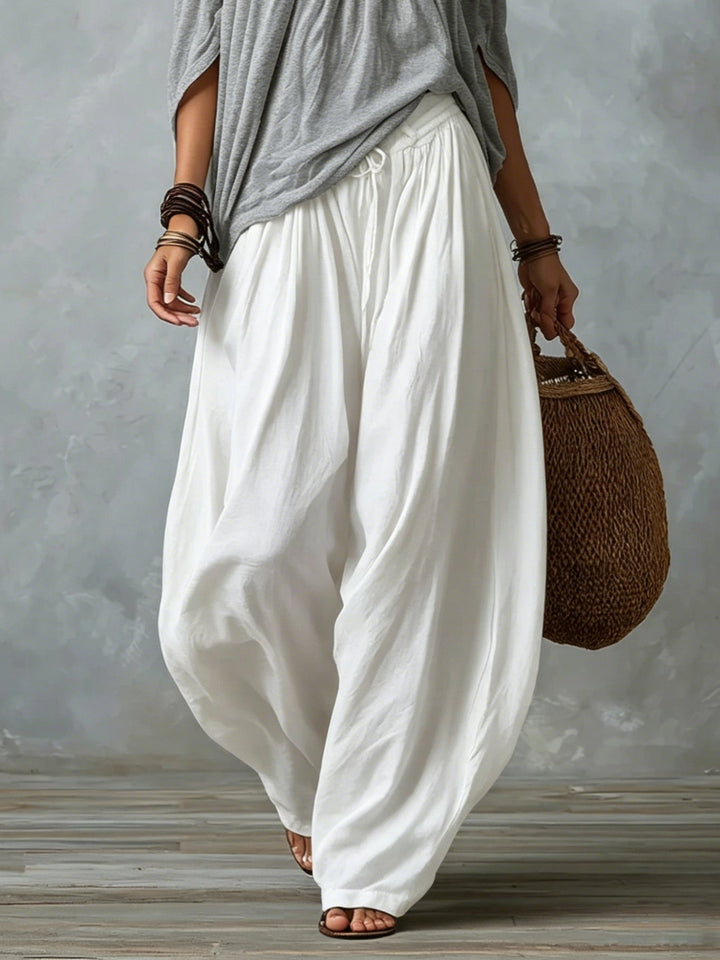Leslie off-shoulder two-piece set by Bennett and Lowe, featuring a bohemian-inspired flowy top and matching skirt on a model.