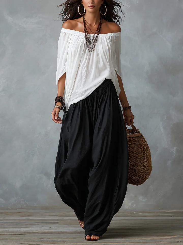 Leslie off-shoulder two-piece set by Bennett and Lowe, featuring a flowing bohemian style with a fitted top and matching skirt.