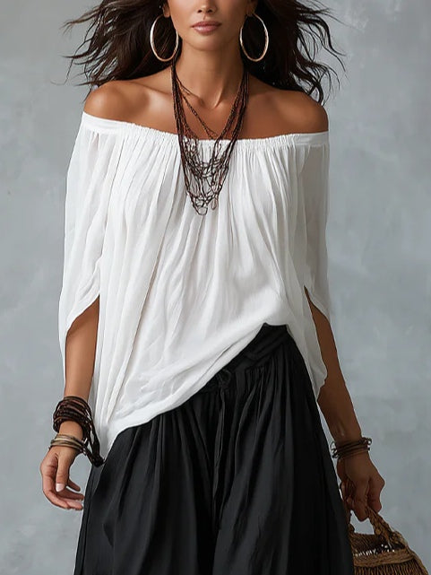Isabella fluid bohemian off-shoulder two-piece set by Bennett and Lowe, featuring a flowing top and matching skirt.