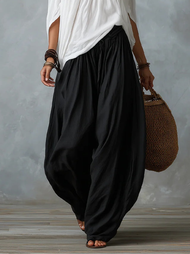 Isabella fluid bohemian off-shoulder two-piece set by Bennett and Lowe, featuring a breezy top and matching skirt.