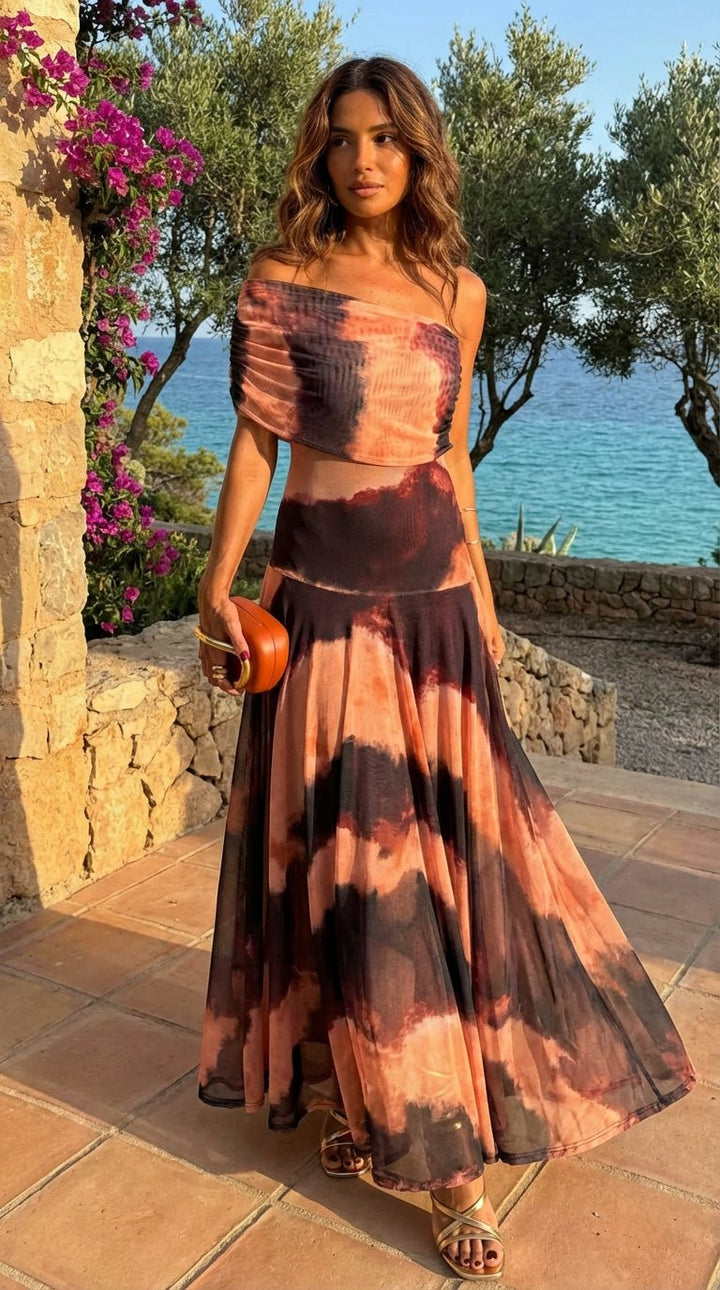 Bianca orange and brown print maxi dress for women by Bennett and Lowe, flowing fabric with vibrant pattern and elegant design.