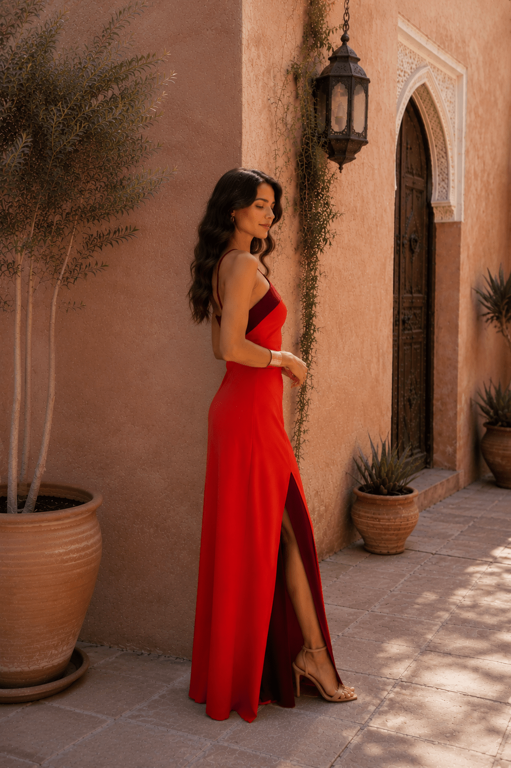 Elegant black halter-neck maxi dress with slit for women, imported by Bennett and Lowe.