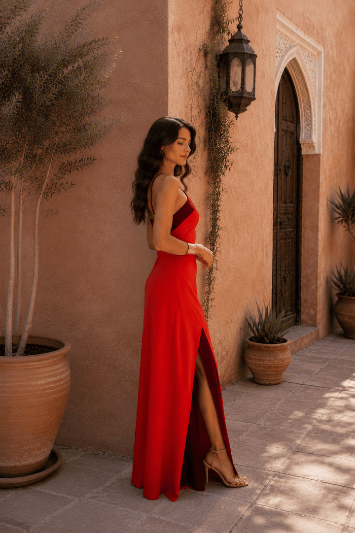Elegant black halter-neck maxi dress with slit for women, imported by Bennett and Lowe.