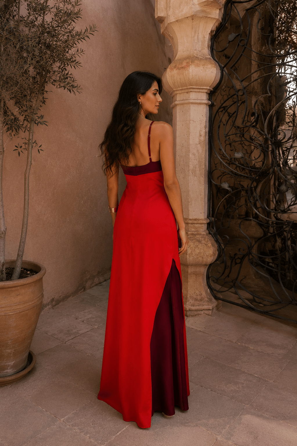 Imported Bennett and Lowe Elisa halter-neck maxi dress with slit, flowing fabric, and elegant design for women.