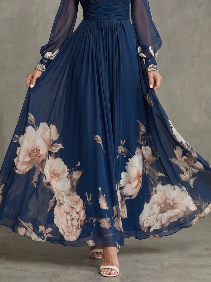 Floral-hem V-neck maxi dress by Bennett and Lowe, featuring a flowing silhouette and intricate floral details.