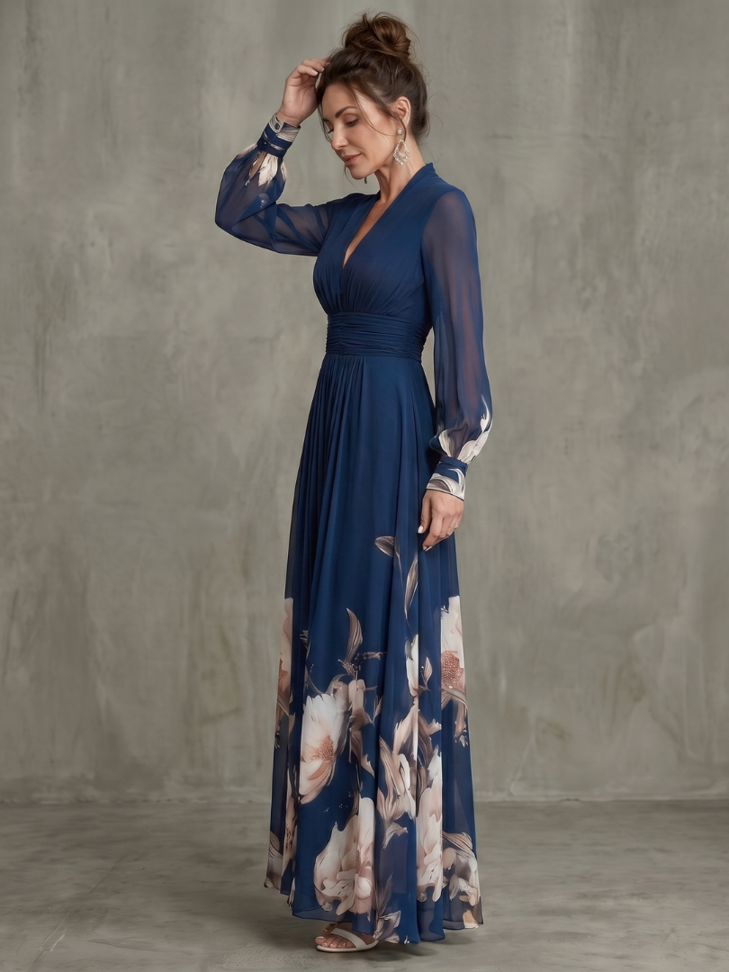 Close-up of the Bennett and Lowe Seraphine floral-hem V-neck maxi dress showing intricate floral detail and elegant neckline.