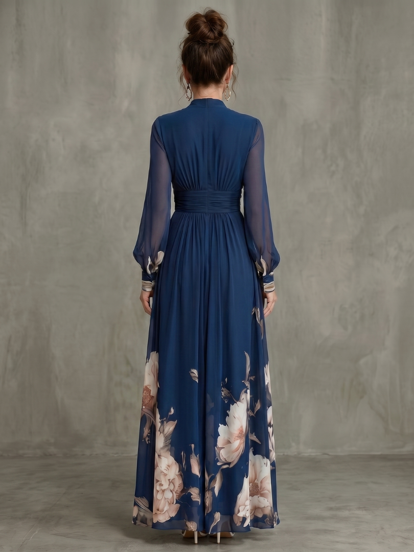 Floral-hem V-neck maxi dress by Bennett and Lowe, featuring a flowing silhouette and intricate floral detail at the hem.