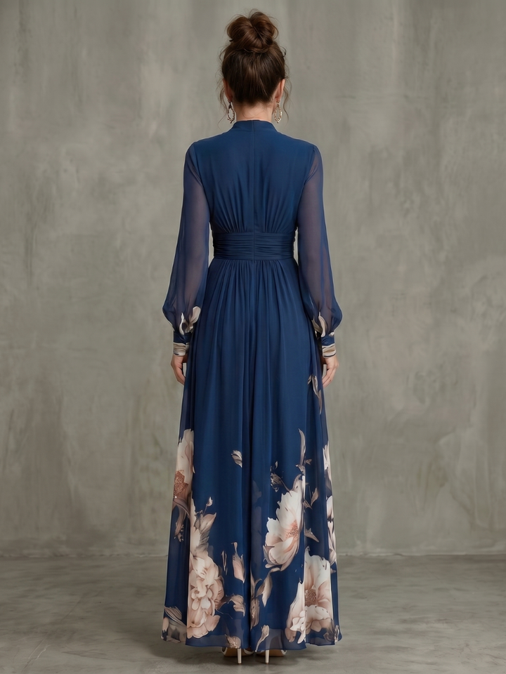 Floral-hem V-neck maxi dress by Bennett and Lowe, featuring a flowing silhouette and intricate floral detail at the hem.