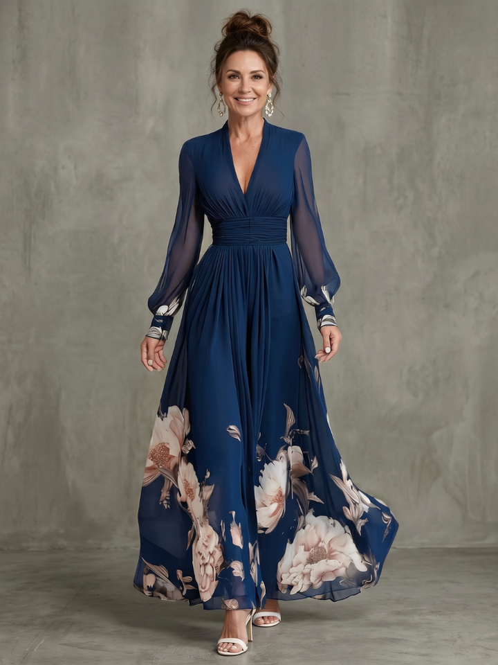Navy floral-hem V-neck maxi dress by Bennett and Lowe, featuring a flowing silhouette and elegant floral pattern.