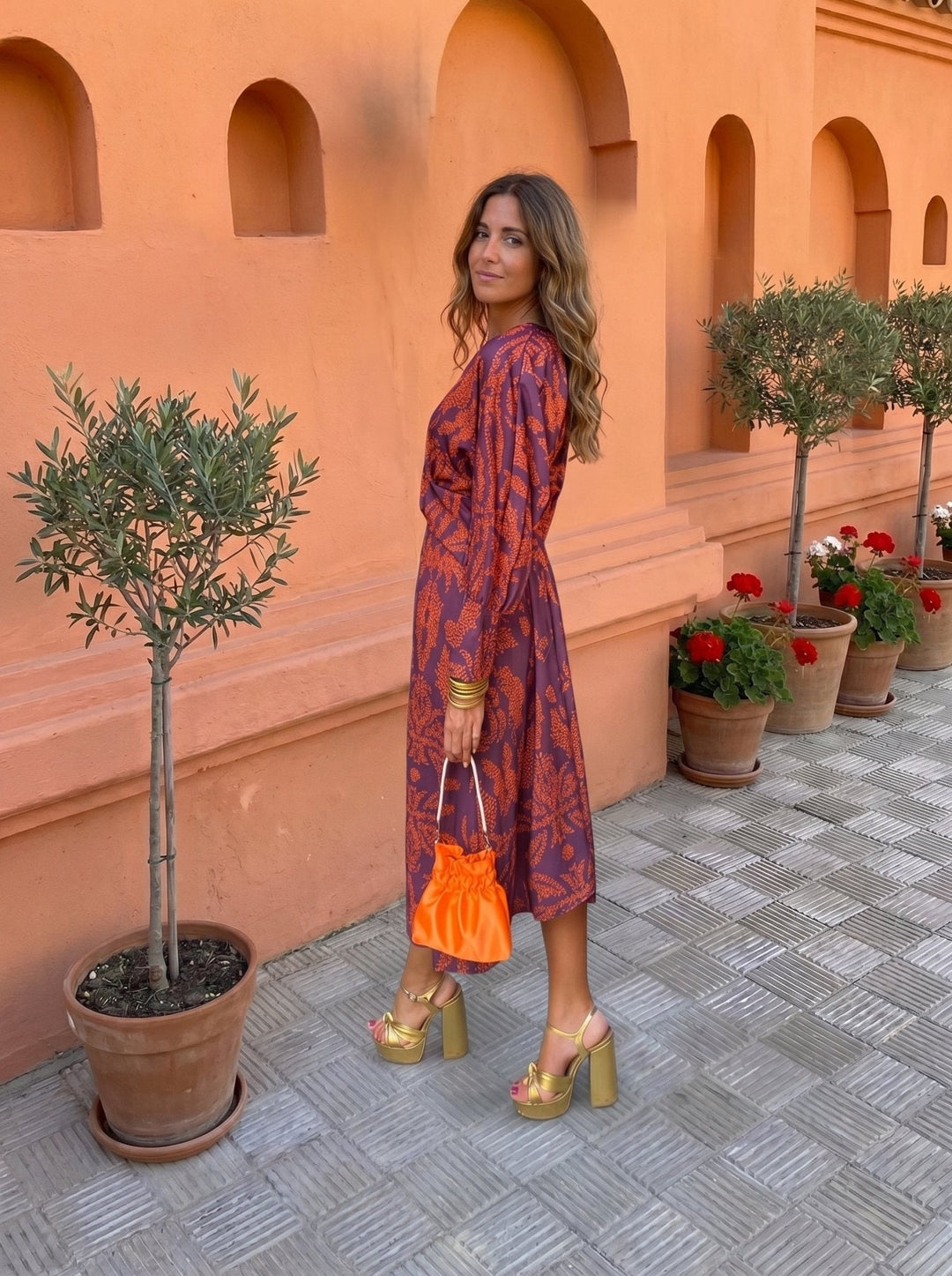 Printed midi dress for women by Bennett and Lowe, featuring a stylish floral design and a comfortable fit.