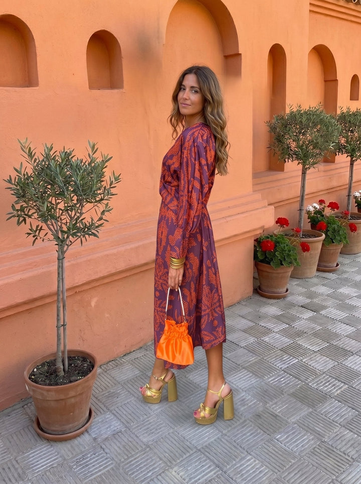 Printed midi dress for women by Bennett and Lowe, featuring a stylish floral design and a comfortable fit.