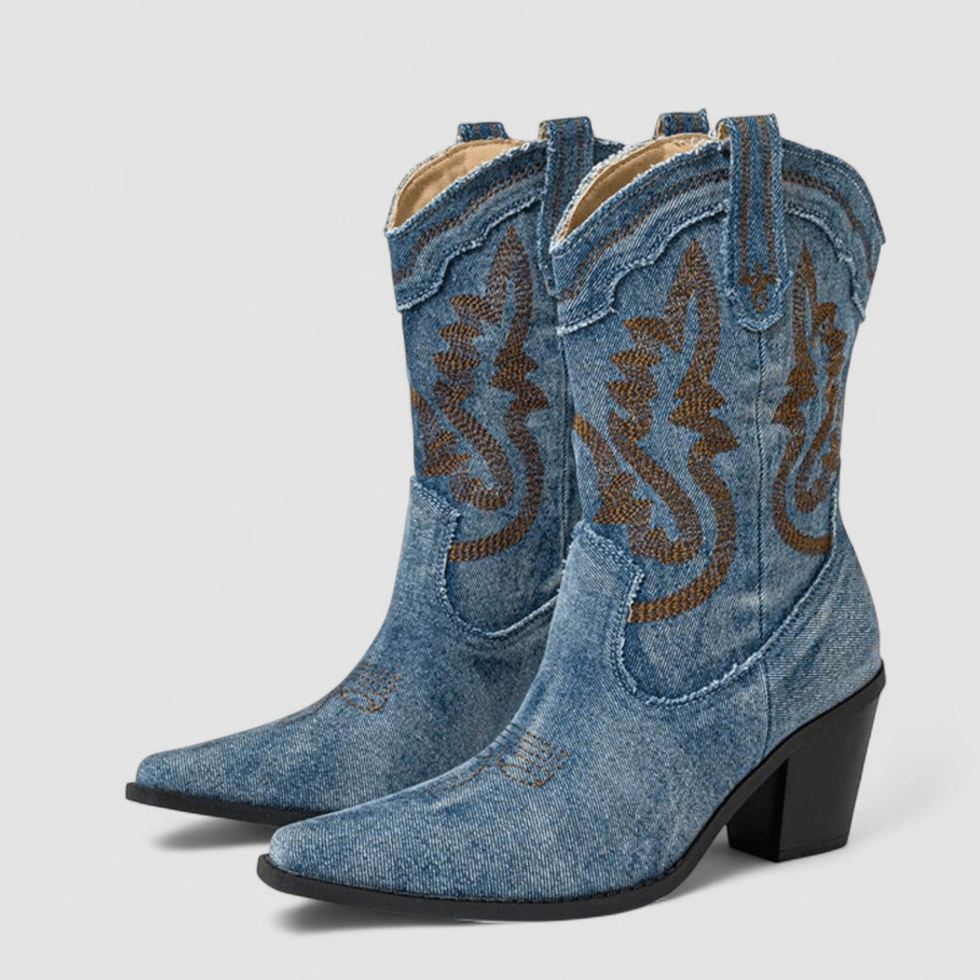 Selena Bennett and Lowe embroidered Western ankle boots in denim with intricate embroidery and pointed toe design.