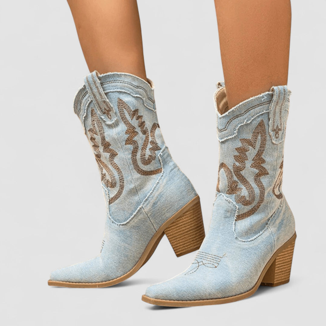 Light blue embroidered Western ankle boots for women from Bennett and Lowe's Selena collection, featuring detailed stitching and stylish design.