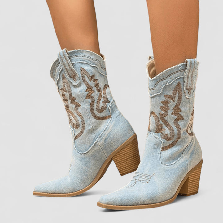 Light blue embroidered Western ankle boots for women from Bennett and Lowe's Selena collection, featuring detailed stitching and stylish design.
