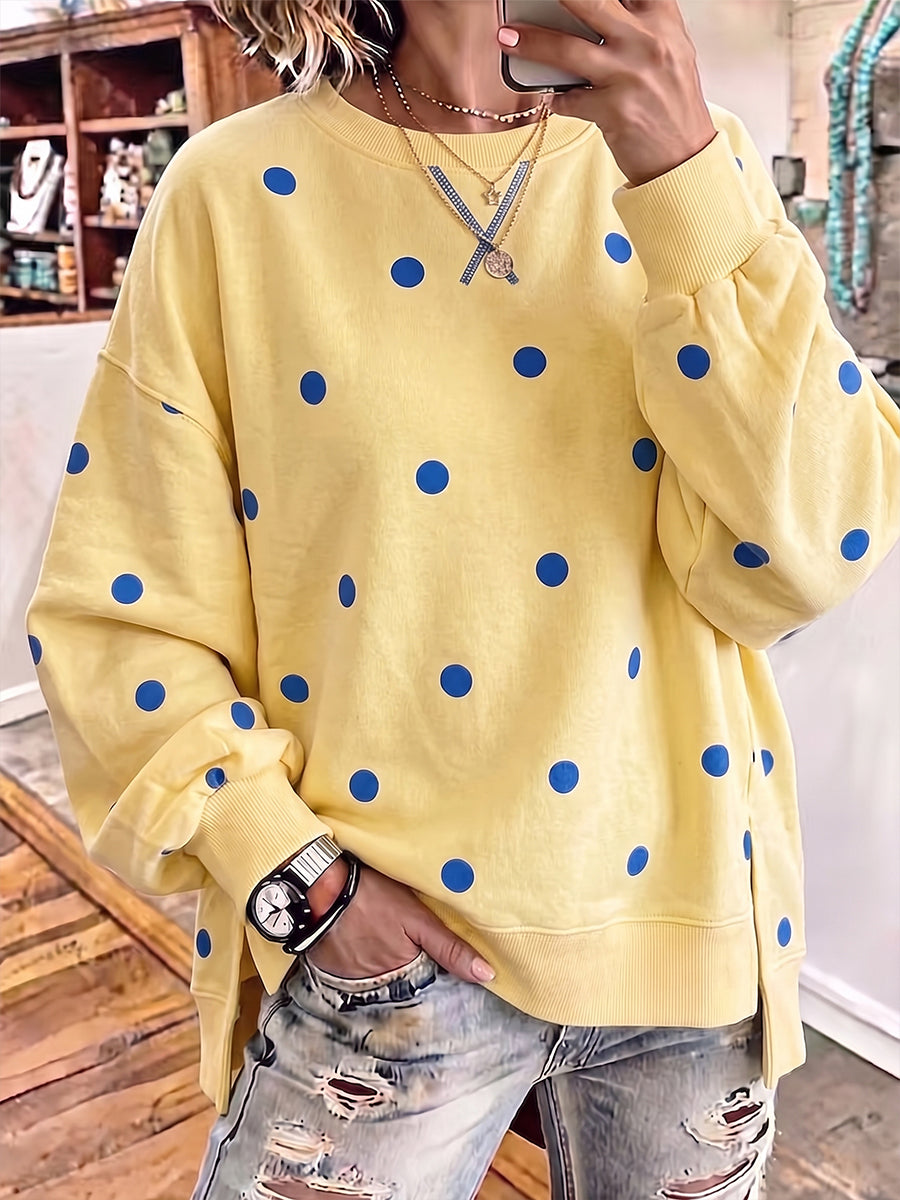 Bennett & Lowe Tessa polka dot relaxed sweatshirt with long sleeves and a casual fit, featuring a black and white polka dot pattern.