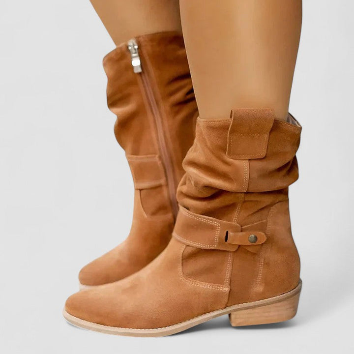 Orthopedic Western boots for women by Bennett and Lowe, featuring brown leather material and decorative stitching.