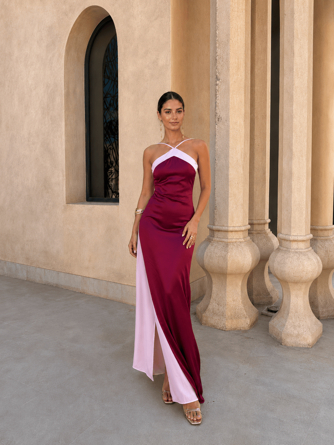 Elegant satin maxi dress for women with a crossover neckline by Bennett and Lowe, featuring a smooth, luxurious fabric.