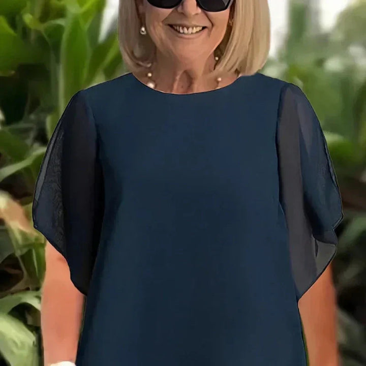 Patricia asymmetrical top and pants set by Bennett and Lowe, featuring stylish, modern design and comfortable fit.