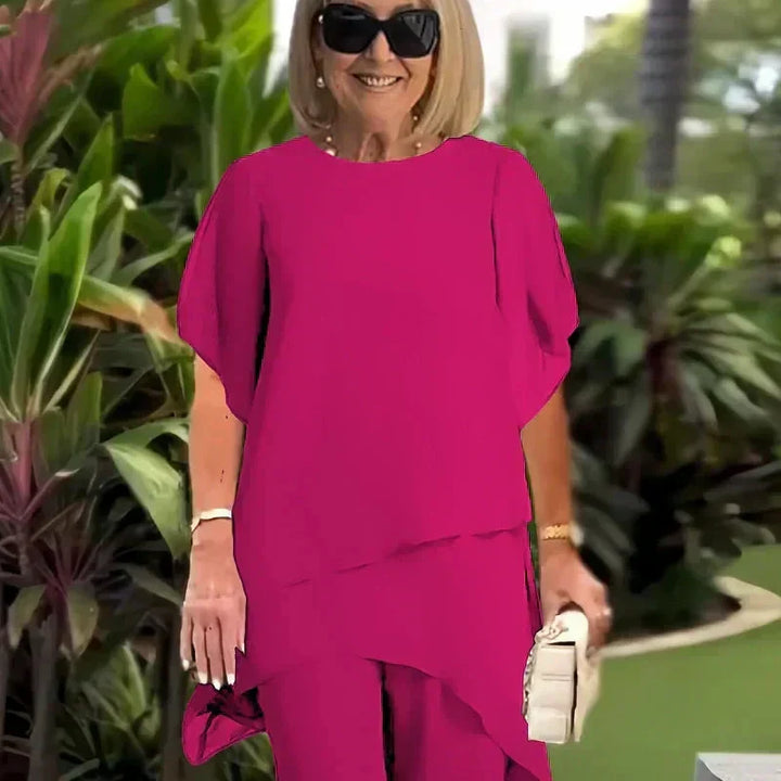 Patricia asymmetrical top and pants set by Bennett and Lowe, featuring a stylish, modern design with coordinated matching fabric.