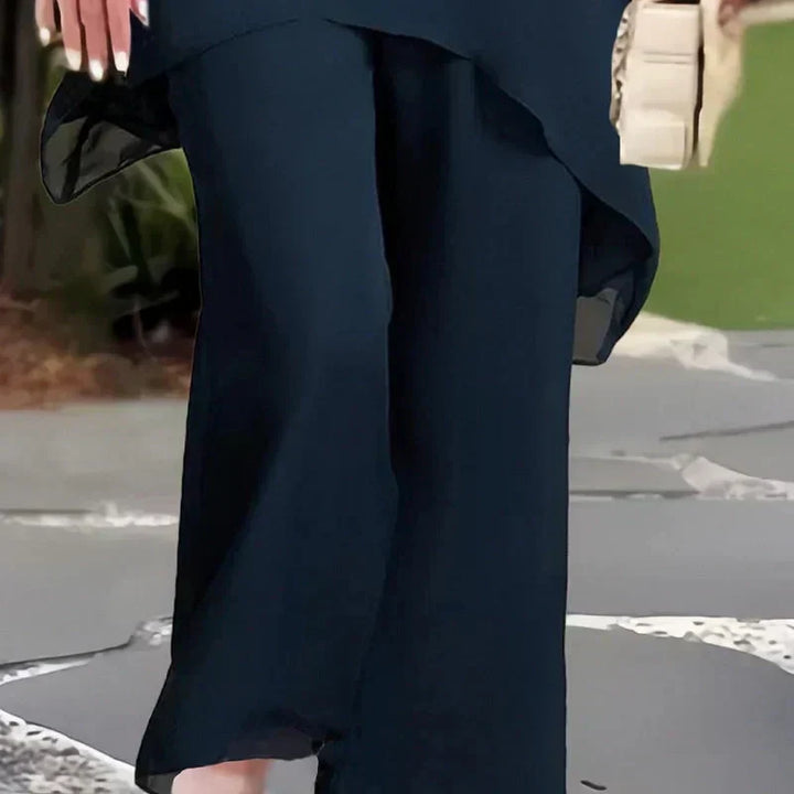 Patricia asymmetrical top and pants set by Bennett and Lowe, featuring stylish, modern design in a coordinated fashion ensemble.