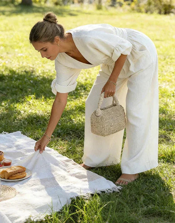 Bennett and Lowe Elise deep V-neck wide-leg women's jumpsuit, stylish and comfortable, shown in a natural pose.