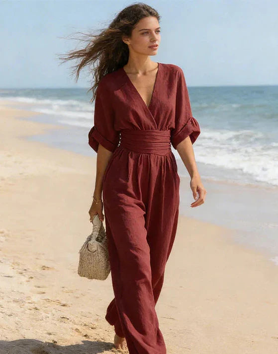 Bennett and Lowe Elise deep V-neck wide-leg women's jumpsuit, shown in a stylish, flowing fabric with a fitted waist and elegant design.