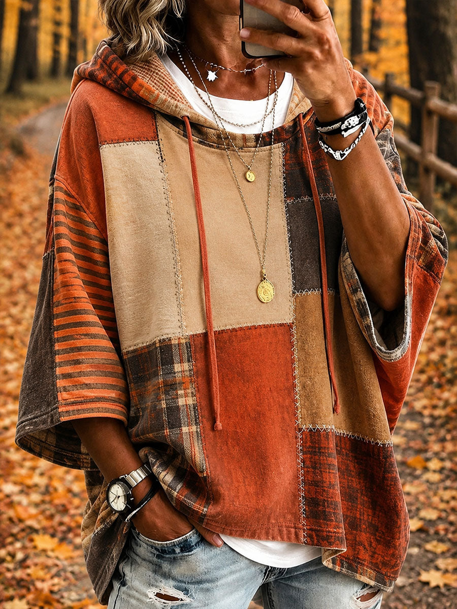 Mirela Bennett & Lowe oversized hoodie with artistic patchwork design, featuring colorful fabric patches and a relaxed fit.