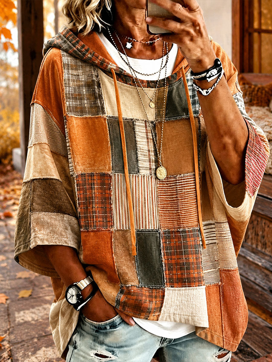 Gabriela oversized hoodie by Bennett & Lowe with autumn-toned patchwork, cozy fit, and relaxed style displayed on a model.