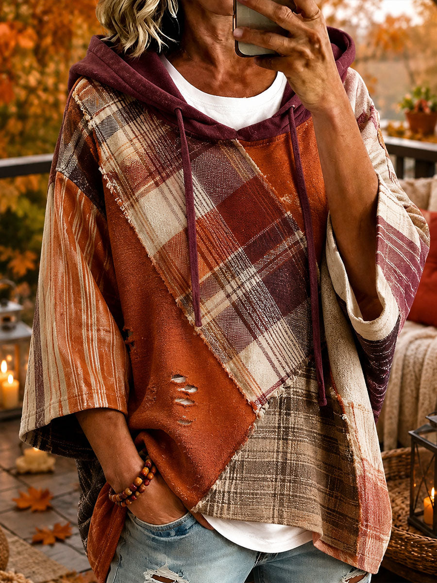Adriana oversized hoodie with autumn-toned patchwork design by Bennett & Lowe, showcasing a cozy, oversized fit and vibrant fall colors.