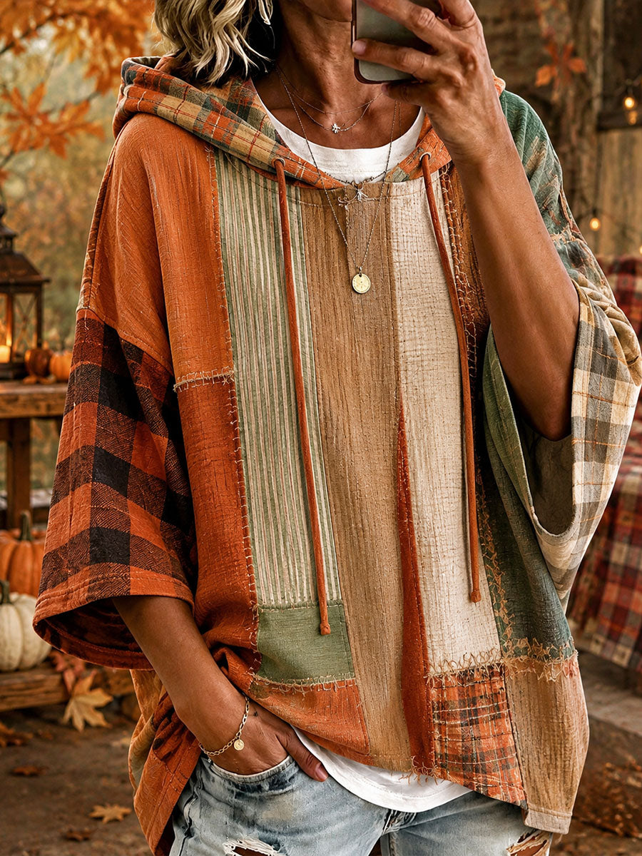 Andrea Bennett & Lowe autumn-toned patchwork oversized hoodie with a cozy, relaxed fit and colorful patchwork design.
