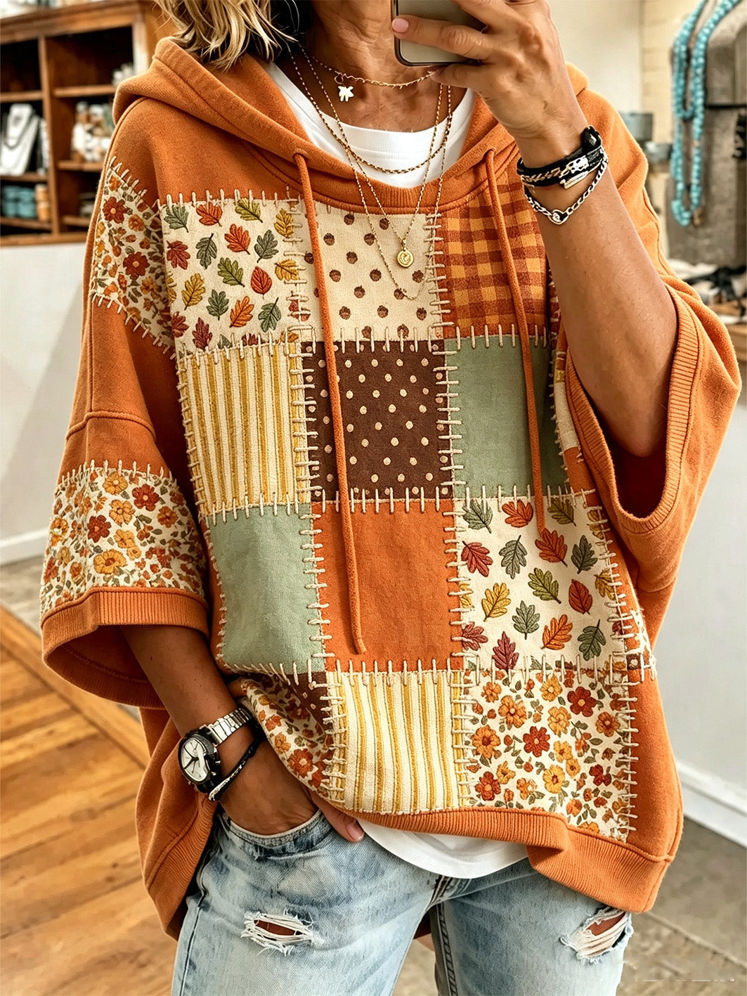 Corina Bennett & Lowe oversized hoodie with autumn leaf print, featuring a cozy, relaxed fit and fall-inspired design.