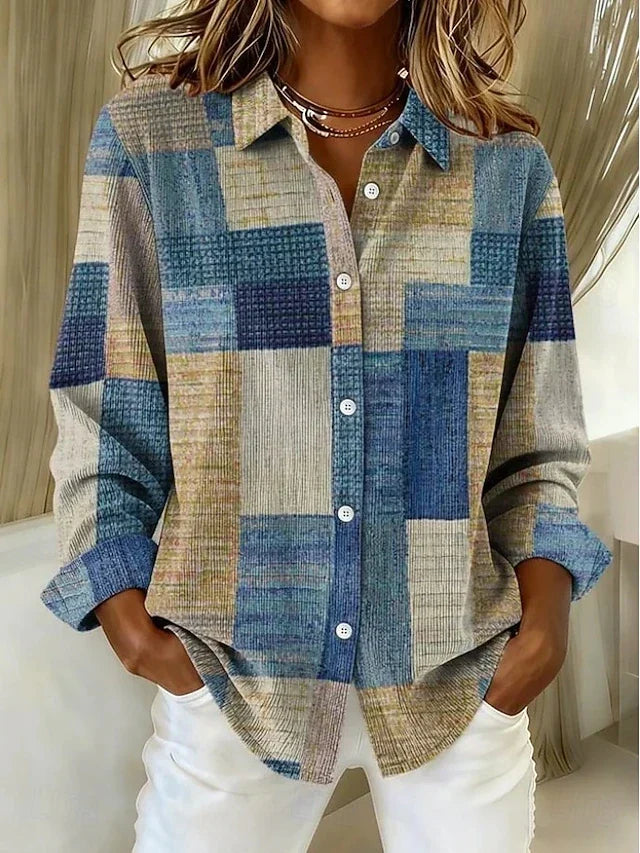 Therese patchwork button-front blouse by Bennett and Lowe, featuring colorful fabric patches and a classic collar.