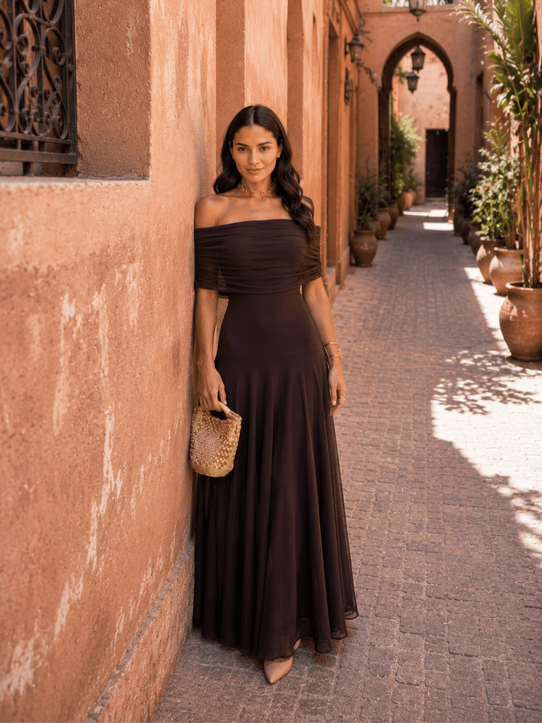 Brown Toledo-style dress for women by Bennett and Lowe, featuring a stylish Adriana design with elegant details.