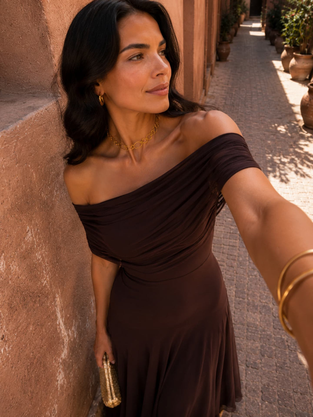 Brown Toledo-style dress for women by Bennett and Lowe, featuring a stylish Adriana design with elegant details.