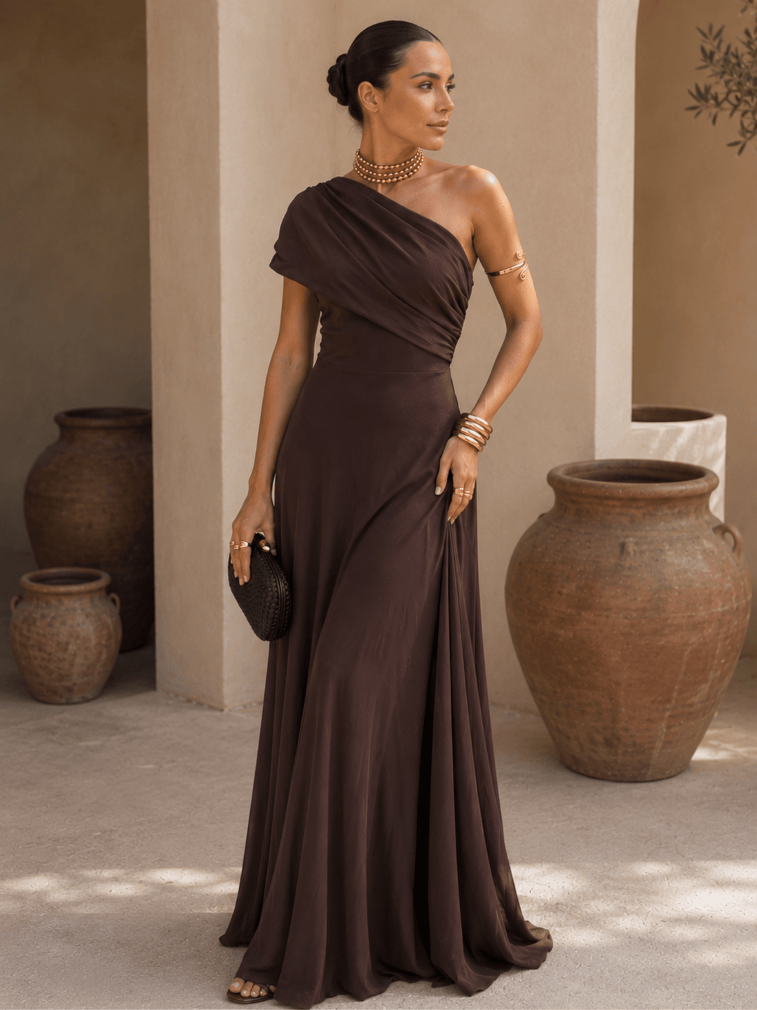Brown Toledo-style dress for women from Bennett and Lowe, featuring a stylish Adriana design with elegant details.