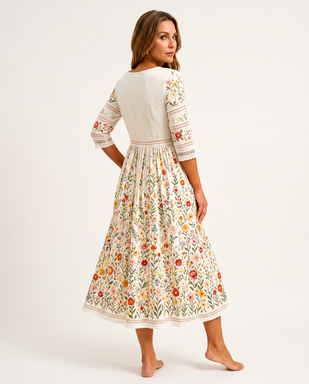 Bennett and Lowe Wildflower Meadow Charm Midi Dress with floral print, fitted waist, and flowing skirt, perfect for summer occasions.