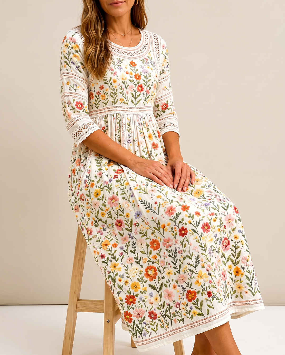 Bennett and Lowe Wildflower Meadow Charm Midi Dress with floral print, fitted bodice, and flowing skirt on a mannequin.