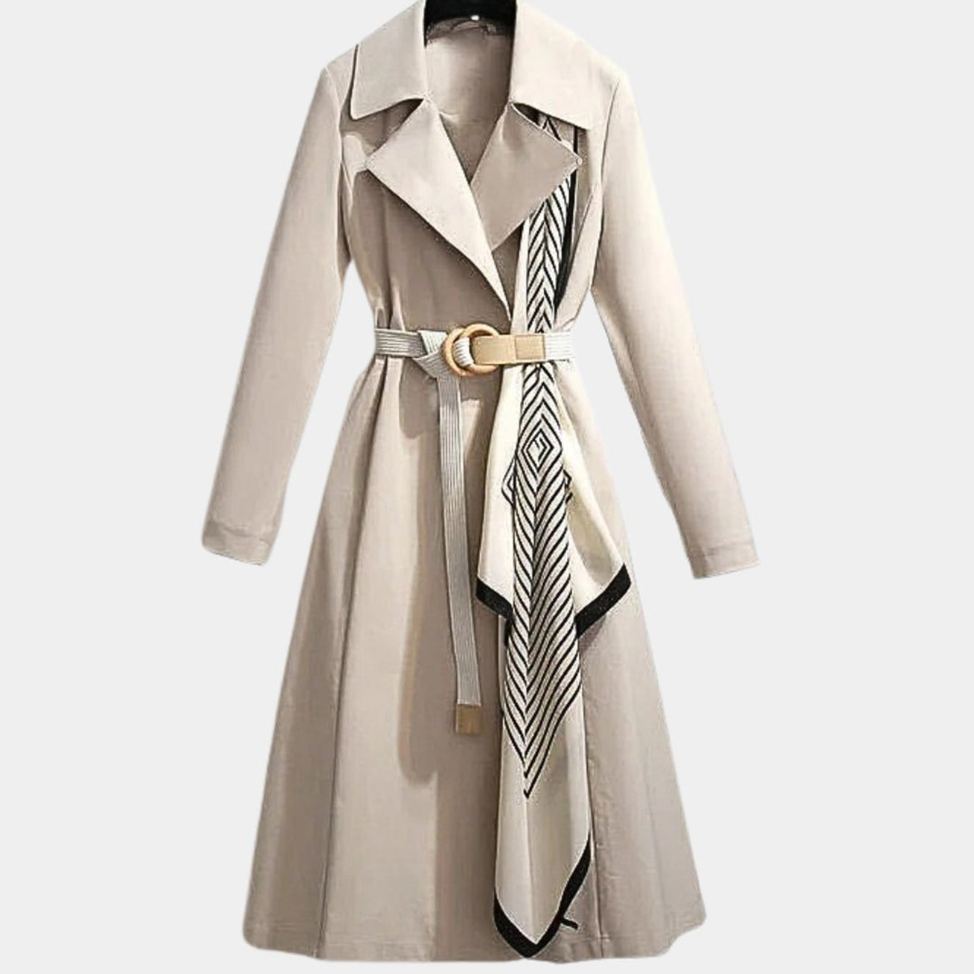 Women’s belted classic midi trench coat by Bennett and Lowe, featuring a tailored fit and neutral color, perfect for transitional weather.