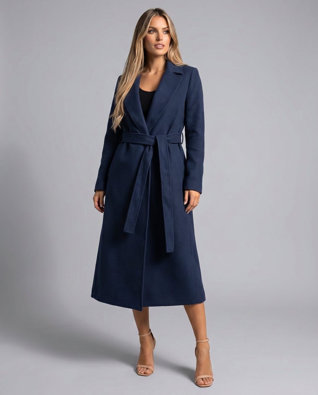 Bennett and Lowe Josie belted long lapel wool-blend trench coat worn by a woman, featuring a tailored fit and classic design.