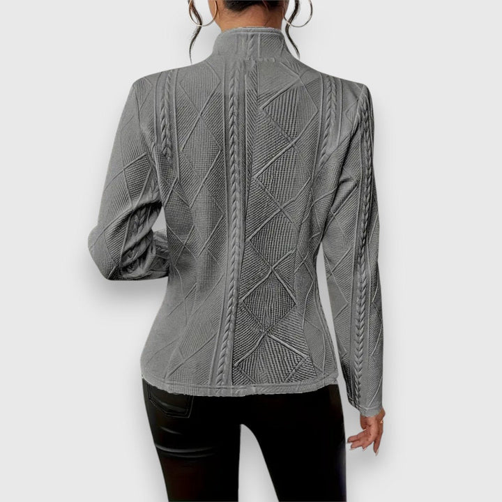 Women's textured Bennett and Lowe Loretta cardigan with button-front, cable-knit pattern, long sleeves, and mock-neck design.