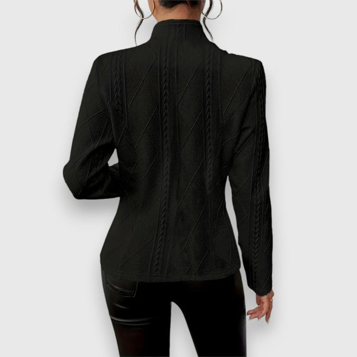 Women’s textured cable-knit cardigan by Bennett and Lowe with button-front, mock neck, long sleeves, fitted style, and cozy design.